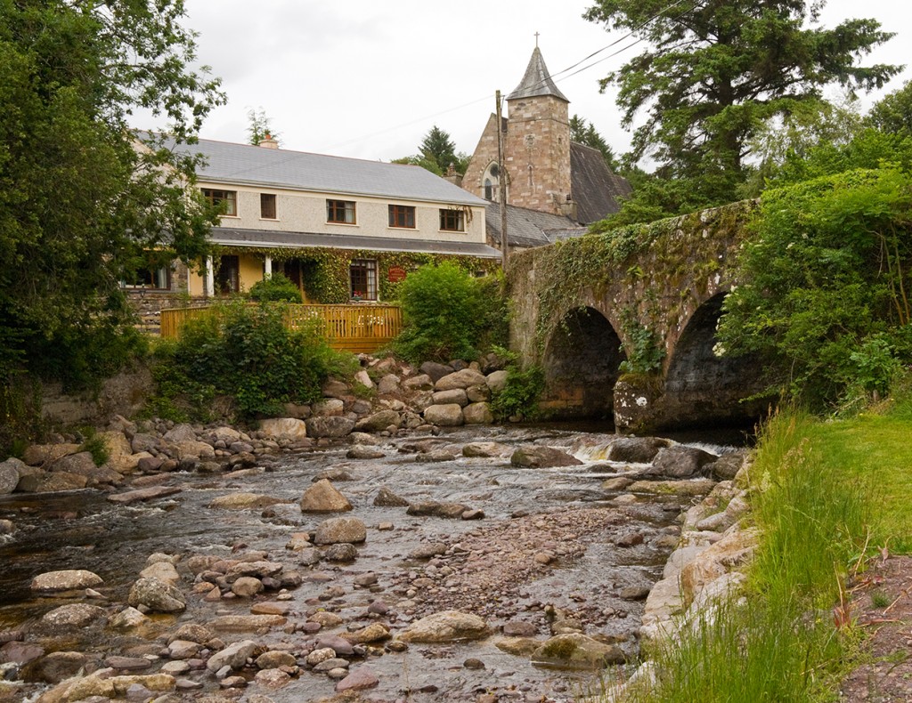 Hanora's Cottage and the Nire River with St Helena's Church