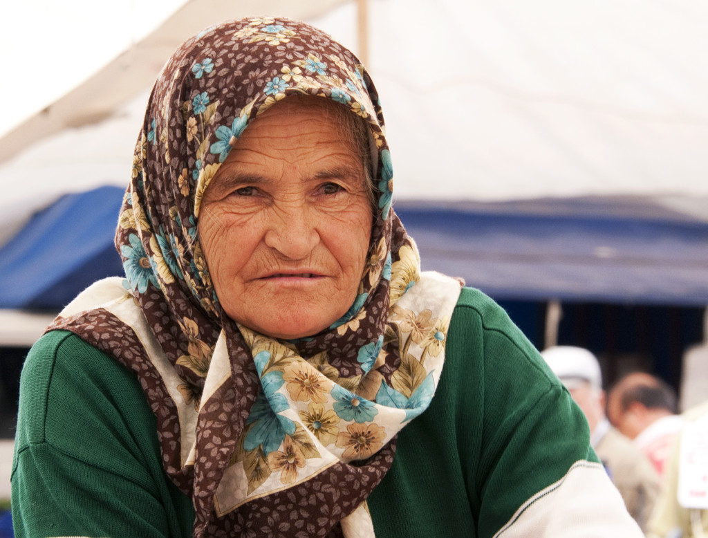 Elderly woman making Gozleme, Kalkan, Turkey