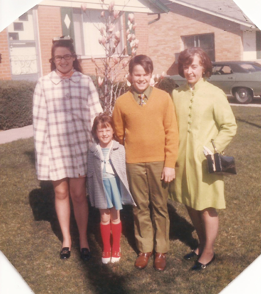 Easter Sunday - around 1970?? - my sister, brother, mom and me (i'm the wee one in those bright red socks!)