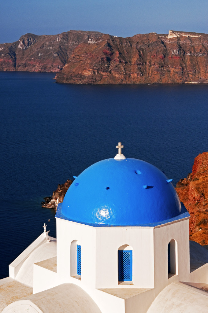Blue domed church and the Aegean Sea, Oia, Santorini, Greece