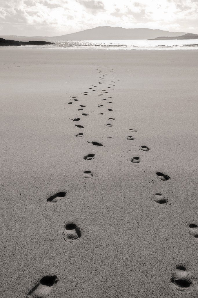Footprints in sand, beach near Kildoon, County Mayo, Ireland