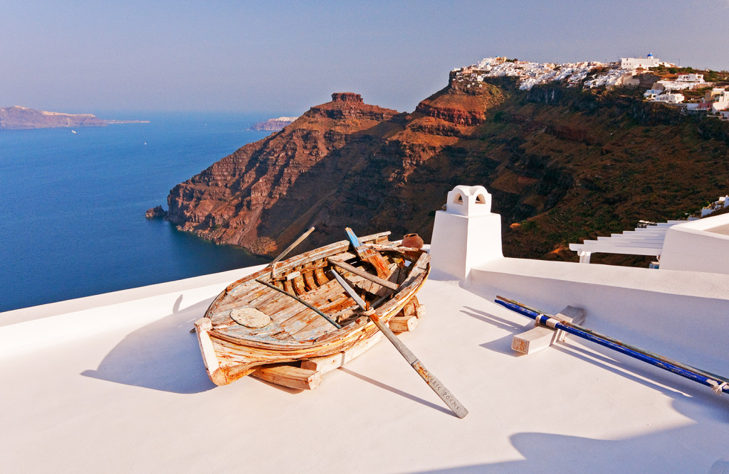 Old wooden boat on rooftop, Fira, Santorini, Greece - one of my dream destinations