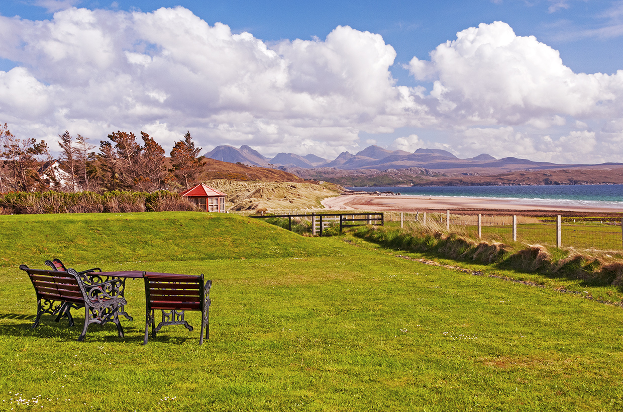 View over bay to Torridon Hills Travel Cheaper to Europe